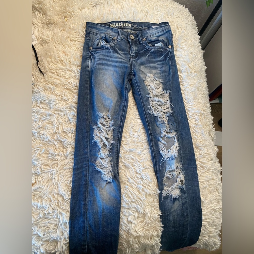 Machine low rise distressed jeans